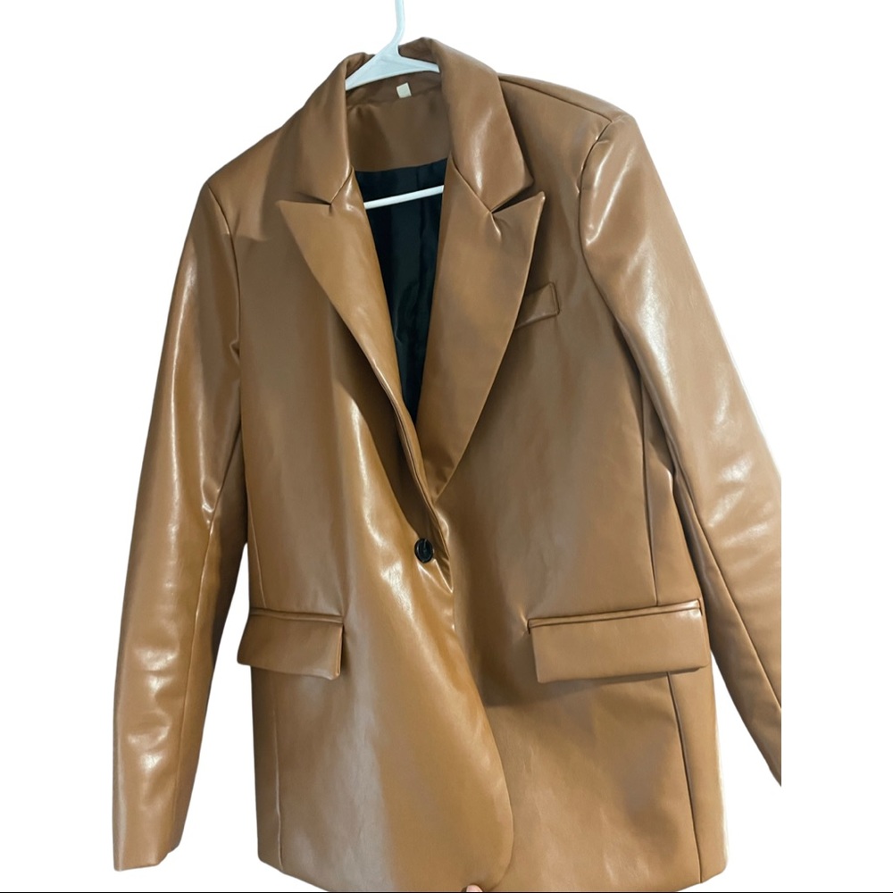 Sla the label’s Tan leather blazer.